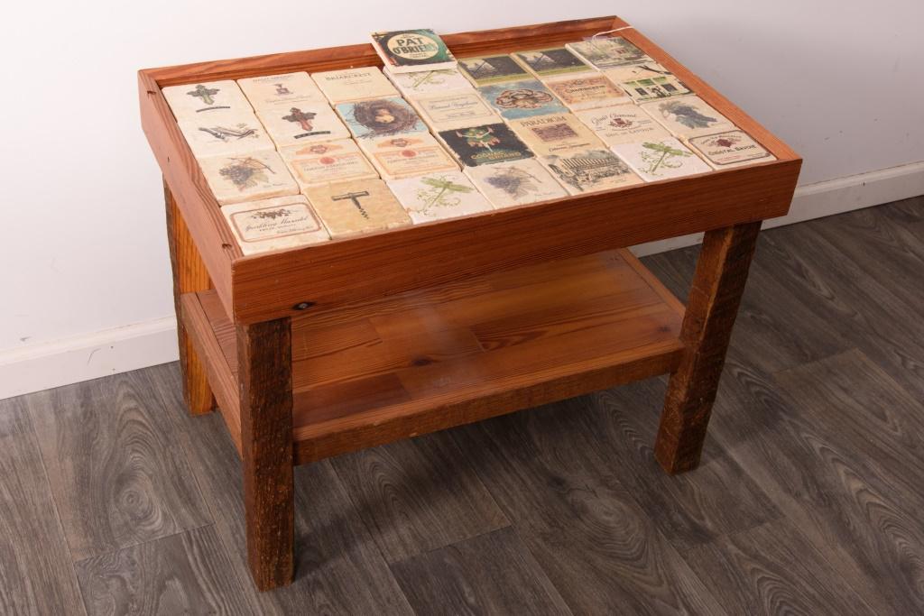 Bench Crafted Table: With a rectangular tray top set with decorative tiles. From the private collection of Roulhac Toledano, noted author, historian, artist, and tireless promoter of Charlottesville.