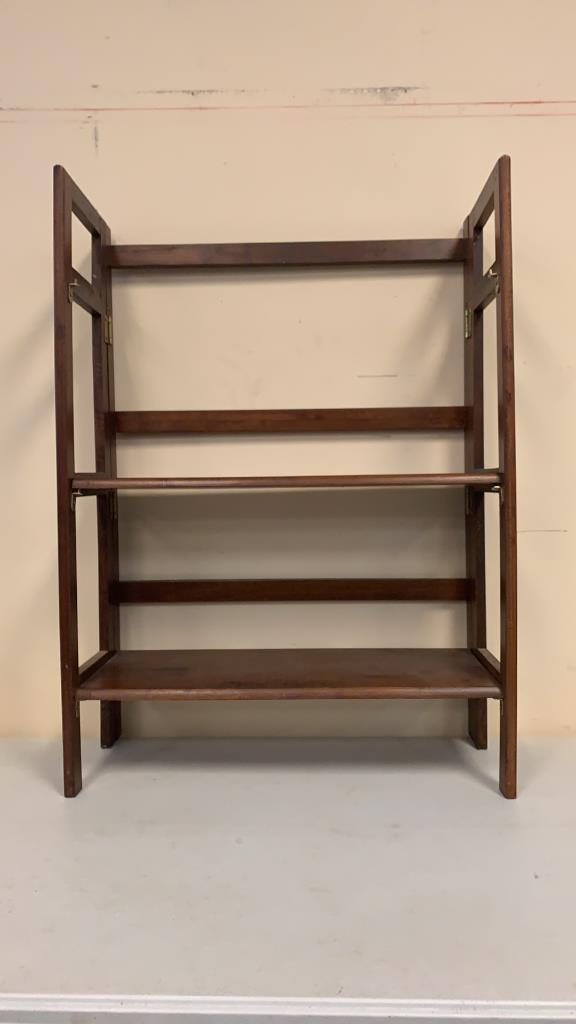 Folding Shelving Unit: In overall good condition consistent with age and use. One shelf missing. Measures approximately 38-1/2" high, 27-1/4" wide and 11-1/2" deep.