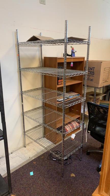 Metal Shelving Unit: In good condition.