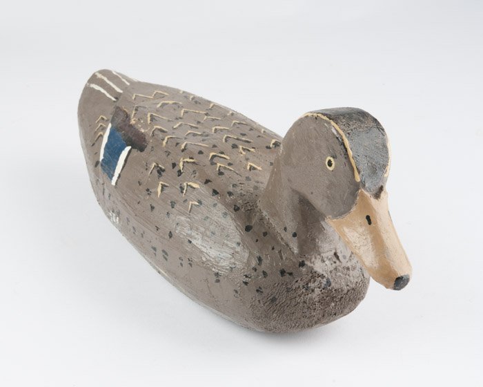 A Laurent Verdin Mallard Duck Decoy: Unsigned. Label to underside reads 'Laurent Verdin Mallard Hen C. 1975'. Height: 6 1/2" Length: 16"