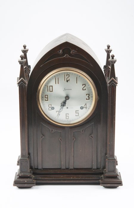 A Sessions Mantle Clock with Westminster Chimes: In Gothic Revival style. Height" 16 1/2" Width: 12" Depth:7"