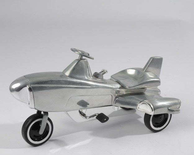 Xonex Cast Metal Toy Rocket Tricycle: Marked "Xonex Cleve OH Made in China".Dimensions: 12"L x 6-1/2"H