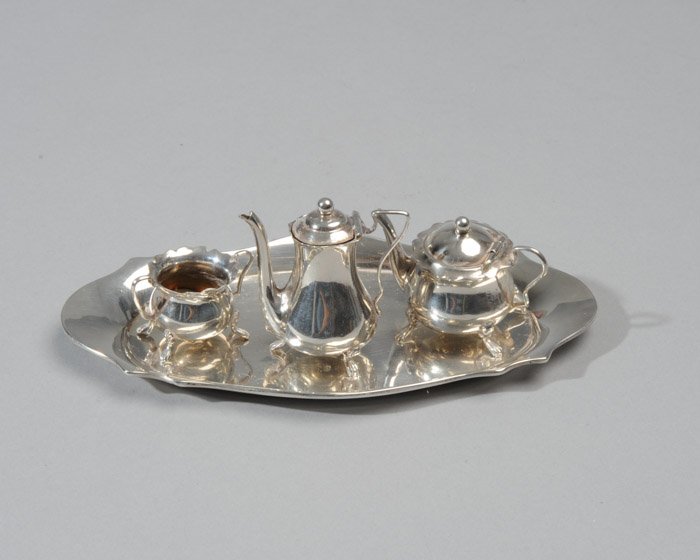 Ellis Jacob Miniature Sterling Silver Tea Set: Four piece miniature sterling tea set by Ellis Jacob. Tray length: 5-1/4". 1.62 T oz.