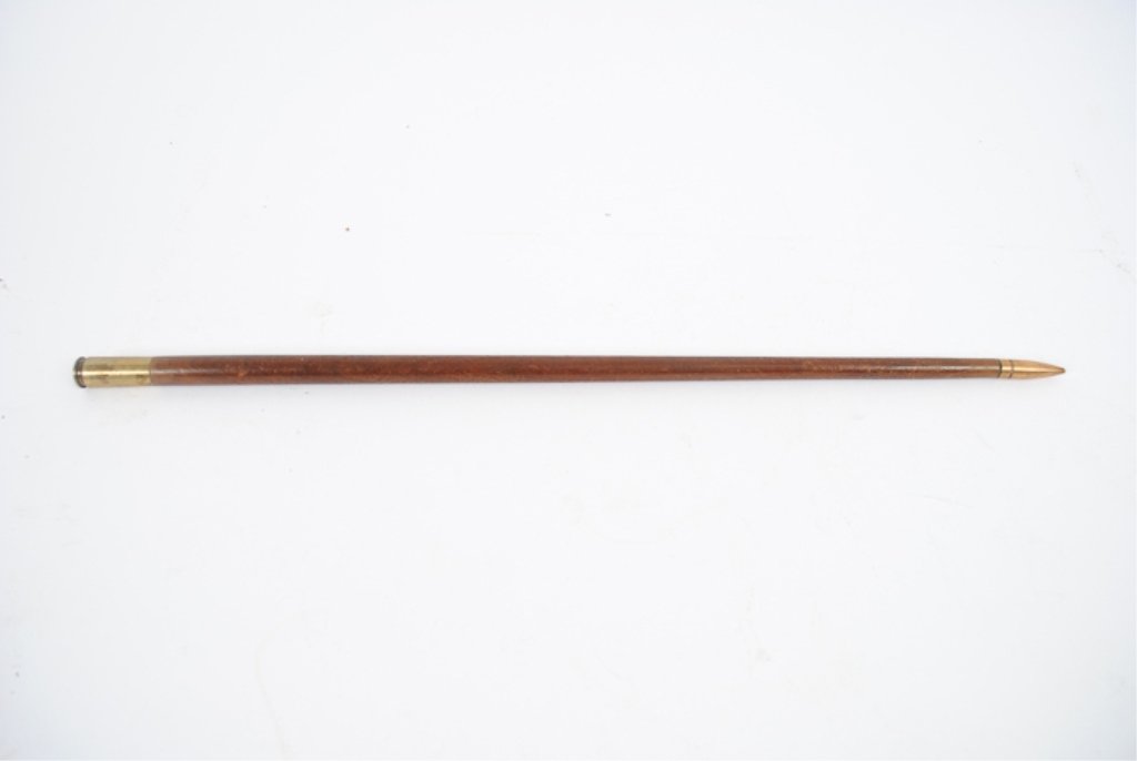 Trench Art Cane: 50 cal. casing handle with 308 shell tip and hickory stick.