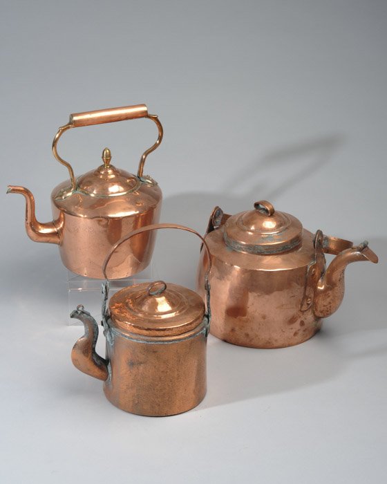 Three (3) 19th C. Copper Tea Kettles: Varying sizes and condition. Each with swing handle. Largest: 12" width.
