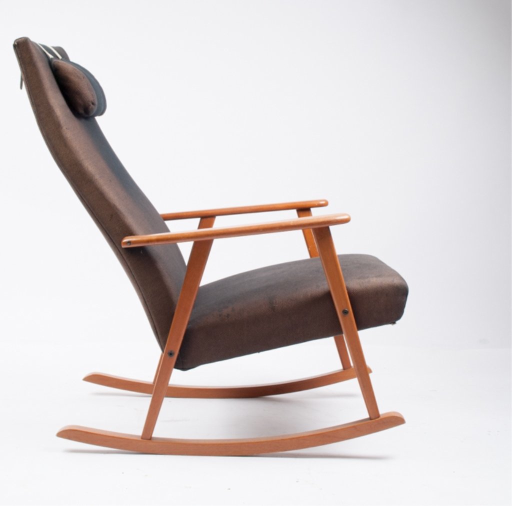 Swedish Rocking Chair: Measuring approximately 38" tall to top of back, 24-1/2" wide arm to arm, and 21" deep; wood frame with black upholstered seat; head cushion with suede straps; one strap is missing two buttons; materi