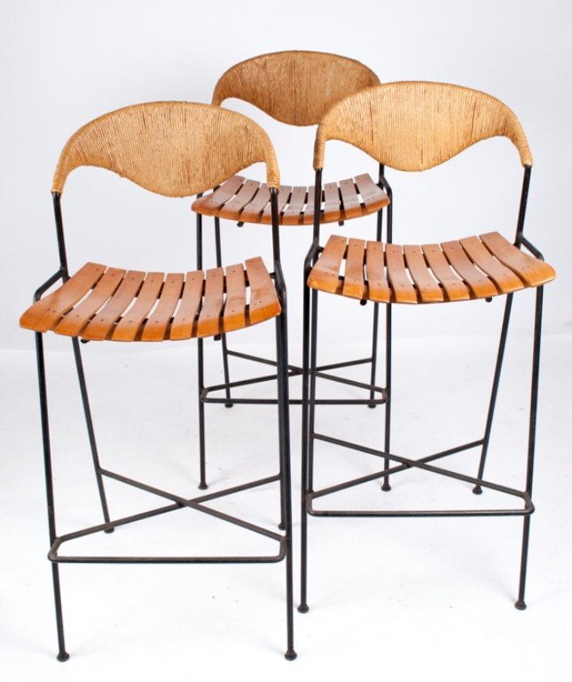 Set of Three (3) Umanoff Bar Stools: Measures approximately 40-1/2" tall, 18" wide, and 14-1/2" deep; black metal frame with wood panel seats and wicker back; a nice set; apparently in good condition.