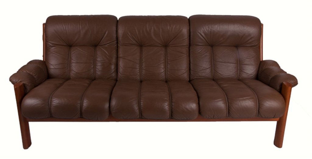 Ekornes Stressless Leather Couch: Brown leather; three back cushions and three seat cushions; wood frame; measuring approximately 33" tall to top of back, 16" tall to top of seat, 74-1/2" wide, and 28-1/2" deep; apparently in good con