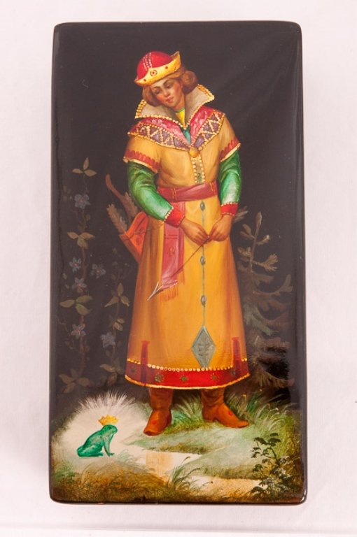 Palekh Russian Lacquer Box: Signed Borisova and decorated with "The Princess and the Frog Prince"; measures approximately 1-1/2" high, 3-1/4" wide,and 6-1/4" deep.