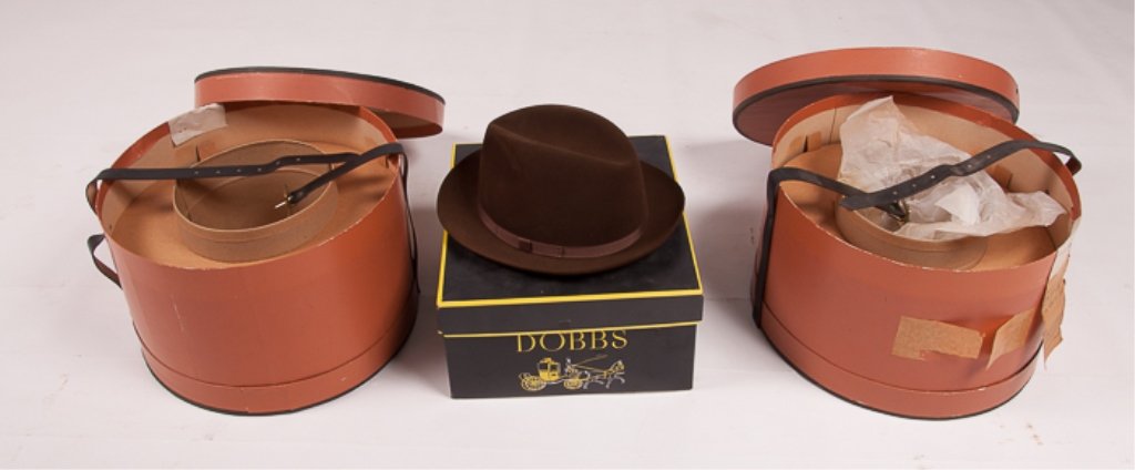Dobbs Hat with Box and Two (2) Empty Hat Boxes: Dobbs brown "mink" jet felt fedora; hat size: 7-3/8; inside reads "Dobbs/ Fifth Avenue/ New York/ New York's Leading Hatters" as well as "Dobbs/ Made in U.S.A" on inside of brim; includes hat box; lot