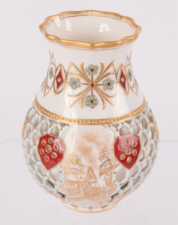 Royal Worcester Decorative Creamer: Double walled reticulated creamer with beautiful gilded embellishments as well as deep red and turquoise enameled adornments; measures approximately 4-1/4" tall and 2" in diameter at top; a similar re