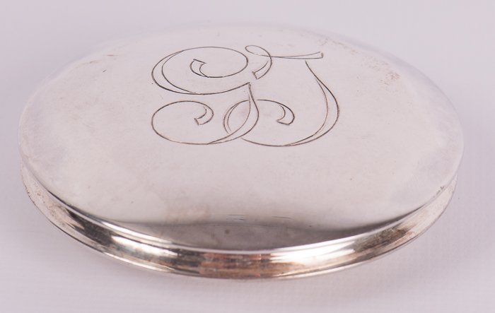 Monogrammed Sterling Silver Compact: Monogrammed "GT"; illegible markings on bottom; measures approximately 2-1/4" in diameter and weighs approximately 1.15 ozt.