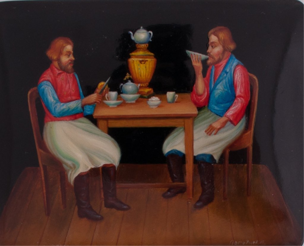 Fedoskino Russian Lacquer Box: Depicting two men drinking tea on lid and painted red to inside; "Made in USSR" written on bottom; measures approximately 1-3/4" tall, 3" wide, and 2-1/2" deep.