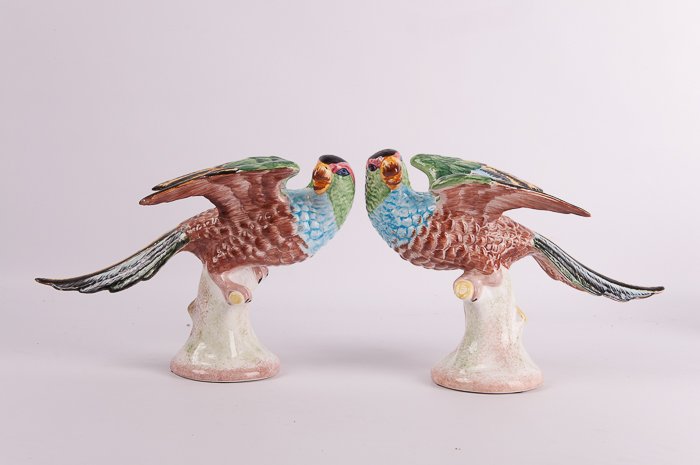 Pair of Italian Porcelain Parakeets: Beautifully crafted pair of Italian porcelain parakeets with "A Mottahedeh design" and "Italy" stamped to inside bottom; each measures approximately 7-1/4" tall; well maintained and in Like New Condit