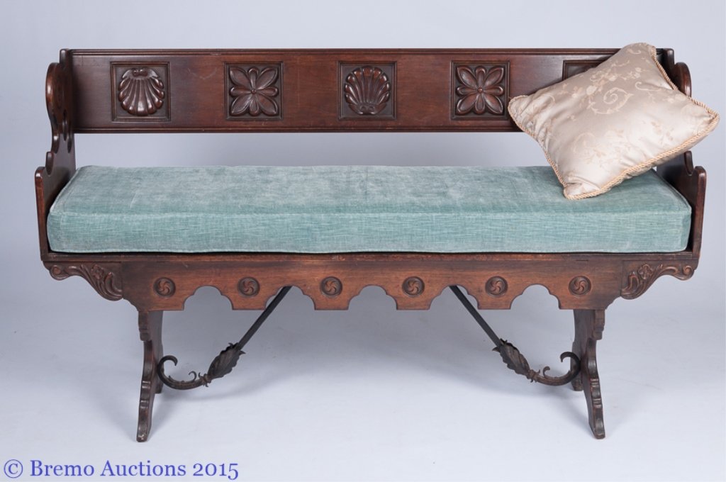 Early 19th Century Walnut Bench: Early 19th Century Walnut Bench Early 19th century, ornately carved walnut bench features a paneled back with shell and flower carvings as well as carved accents throughout and a cast iron support to 