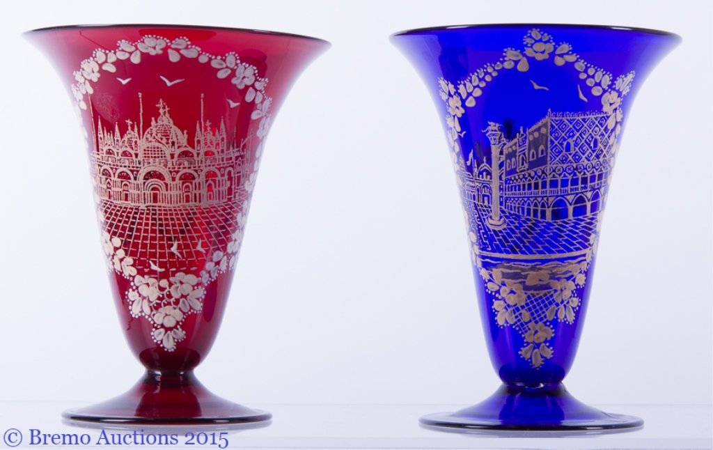 Handpainted Venetian Glass Chalice Pair: Handpainted Venetian Glass Chalice Pair Pair of handpainted glass chalices depicting St. Mark's Cathedral on the red glass chalice and St. Mark's Square on the blue glass chalice; each measures approx