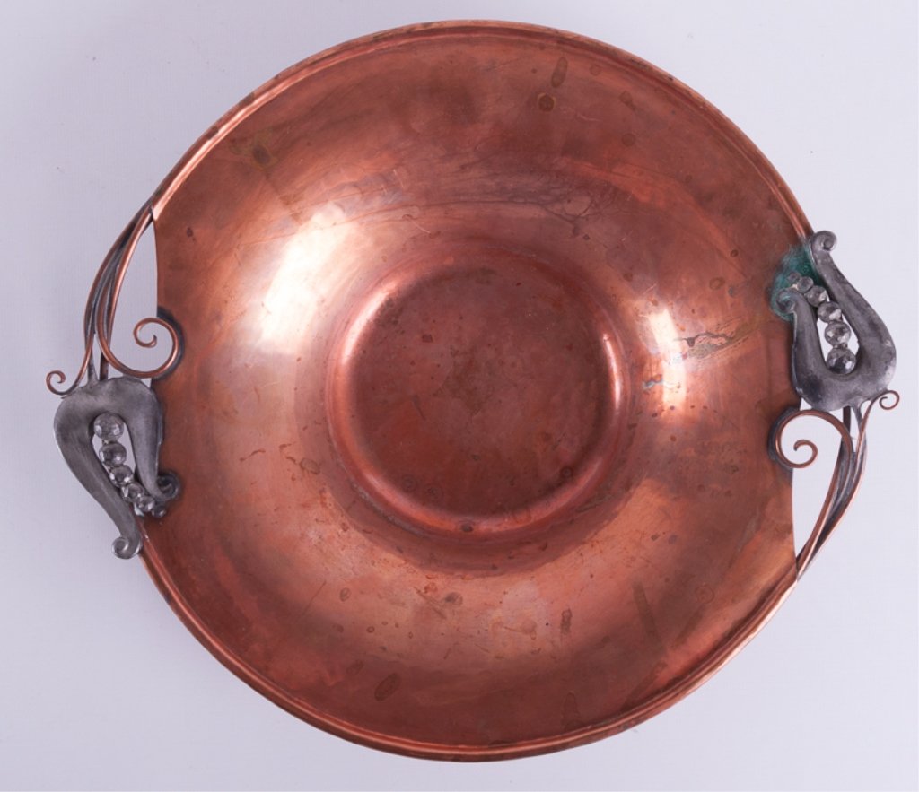 Nekrassoff Copper Bowl: Serge Nekrassoff copper bowl with copper handles that flow into applied pewter floral accents; stamped to bottom "Nekrassoff"; measures approximately 2" tall and 12-3/4" in diameter from handle to han