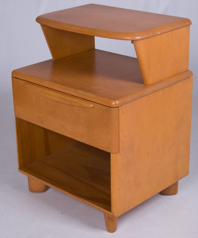 Heywood Wakefield Mid-Century Nightstand: Heywood Wakefield mid-century nightstand with champagne finish; features two tiers and a drawer with a small cubby over the drawer and a large cubby underneath; marked to inside left of drawer with He