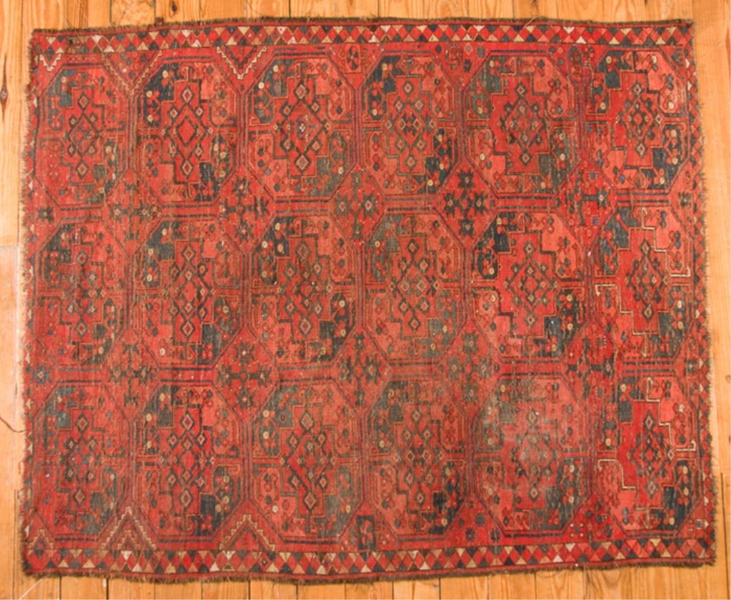 Antique Afghan 5'5" x 6'9" Rug: Featuring an all over geometric pattern with red field, and hues of blue throughout; measures approximately 5'5" x 6'9".