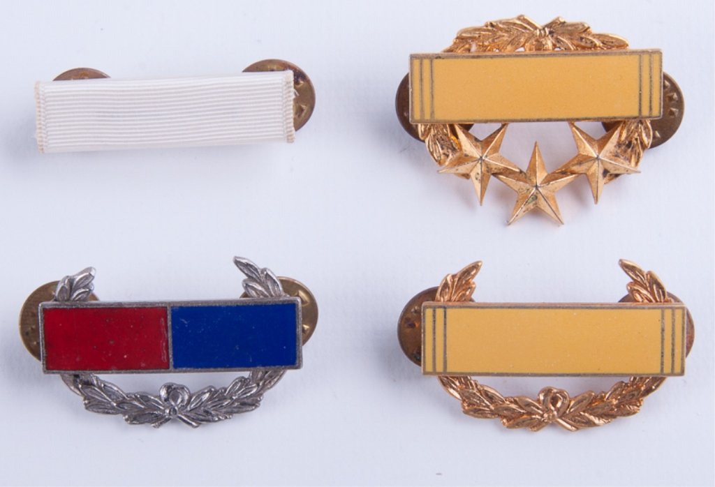 Military Bar Pin Set of Four (4): Group of four (4) military enameled bar stick pins each measuring approximately 1-1/4" in length. Two are yellow with laurel wreath below, one of which has three (3) stars. One has a red rectangle to 