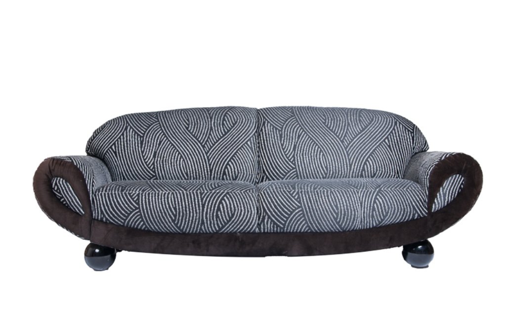 Modern Black & White Striped Sofa: Modern black and white sofa with a swirling stripe design, large black ball feet, and solid black velvet upholstery to front edge that curves up into a smile shape; non-removable cushions; measures ap