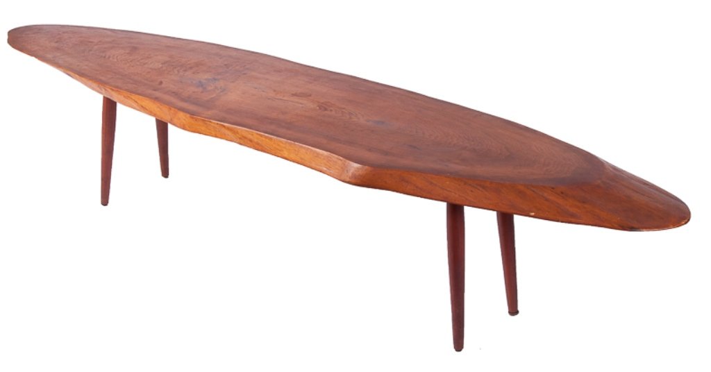 George Nakashima Free Form Coffee Table: George Katsutoshi Nakashima (Japanese American, May 24, 1905-June 15, 1990) free form coffee table on four legs; marked to bottom to be of natural butternut; measures approximately 17-1/2" tall, 85-1/