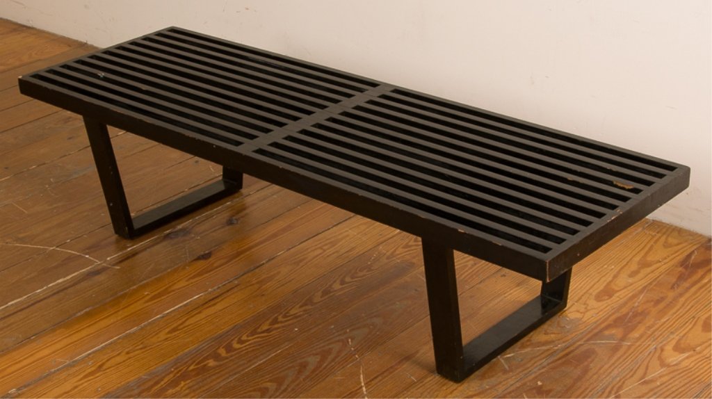 George Nelson for Herman Miller Slat Bench: This is the classic, originally designed, George Nelson bench by Herman Miller; black painted, slatted, and with four legs; partial label underneath; measures approximately 14" tall, 18-1/2" wide, and