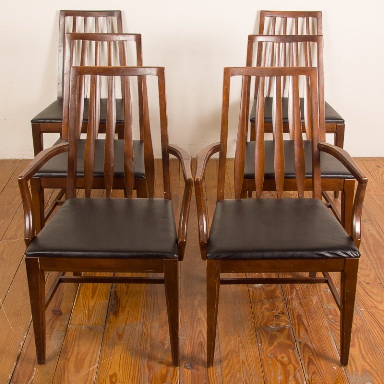 Mid-Century Slat Back Dining Chairs, Six (6): Mid-century vertical slat back dining chair set of six; includes two carvers and four side chairs; all feature black vinyl upholstered seats with mahogany frames; carvers measure approximately 35" tal