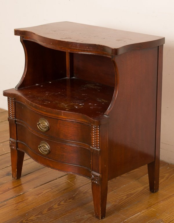 Table Rock Mahogany Nightstand: With large cubby over two drawers with brass handles; on tapered legs with carvings throughout; features a serpentine front; labeled "Table Rock" to inside of top drawer; measures approximately 26-15/