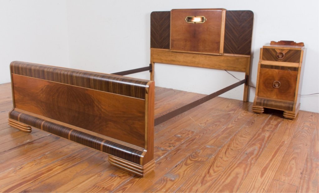 Art Deco Bed Frame & Nightstand: Matching Art Deco bed frame and nightstand; both with mixed wood veneers; bed features a working light to headboard (no glass over light) and measures approximately 42-1/4" tall, 54-1/4" wide, and 83-