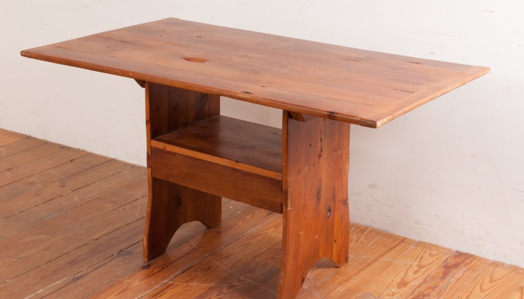 Bench Crafted Pine Hutch Table: Bench crafted pine hutch table with a breadboard end top tilting to reveal a mortise and tenon seat, dovetailed apron and boot jack ends; measures approximately 29" tall, 30-3/4" wide and 52-3/8" long