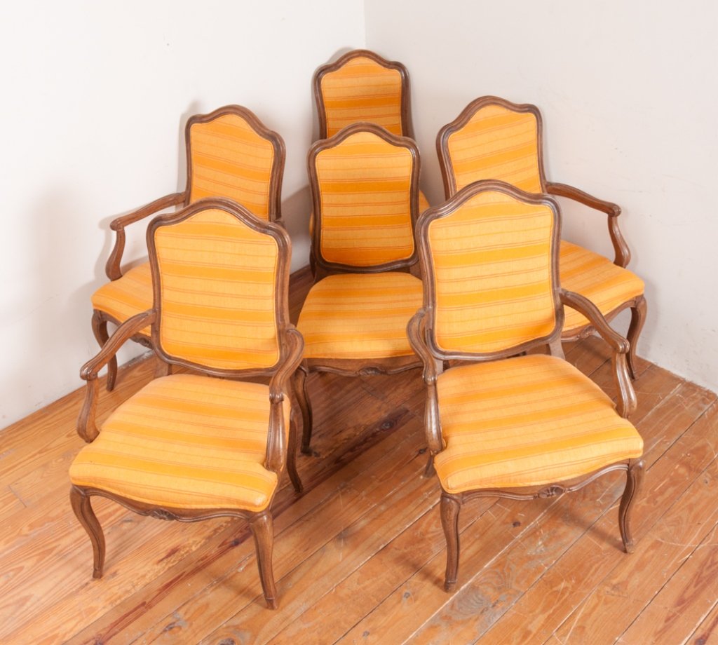 John Stuart Upholstered Dining Chairs, Six (6): Eight John Stuart French style dining chairs; four arm and two side chairs with orange stripe upholstered seats and backs; armchairs marked to bottom, side chairs are unmarked; each measures approxima