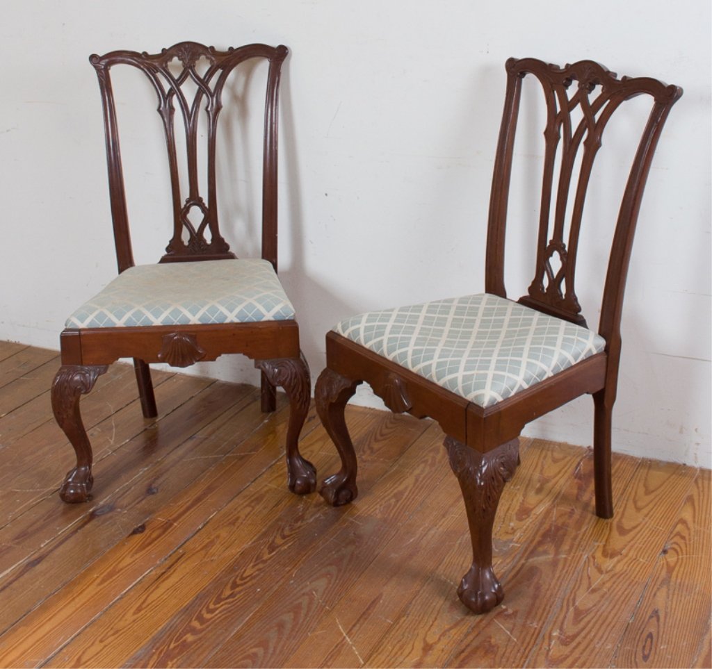 Carved Mahogany Side Chairs, Pair: Pair of carved mahogany pierced back side chairs with front ball and claw feet and upholstered seats; each measures approximately 40" high, 24" wide, with a seat depth of 16" and seat height of 17-3/4