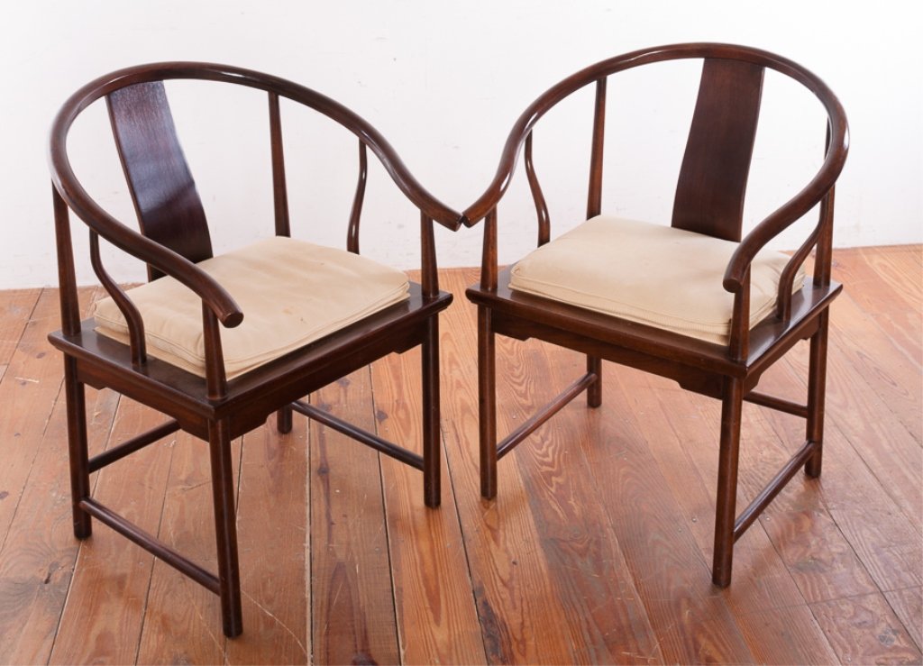 Baker Furniture Asian Style Mahogany Chairs: Pair of Ming influenced chairs with cushioned seat by Baker Furniture in the manner of designer Michael Taylor; measure approximately 32-3/4" high, 25-5/8" wide, with a seat depth of 17-1/4" and seat 