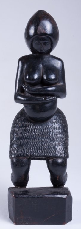 Vivaldo Santos "Negra Do Congo" Wood Carved Figure: Vivaldo Santos "Negra do Congo" ebonized wooden figure; 1966; labeled to bottom and carved "VS" to side; measures approximately 12" tall; in Good overall condition with cracks just below the knees.