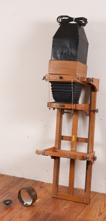 19th C Viennese Photographic Enlarger: The "Kunzel Correctograph" wall-mounted enlarger with Vorne optics; measures approximately 48" tall, 18" wide and 18-1/2" in depth. Marked. Appearing to be complete and in Good condition, has not been