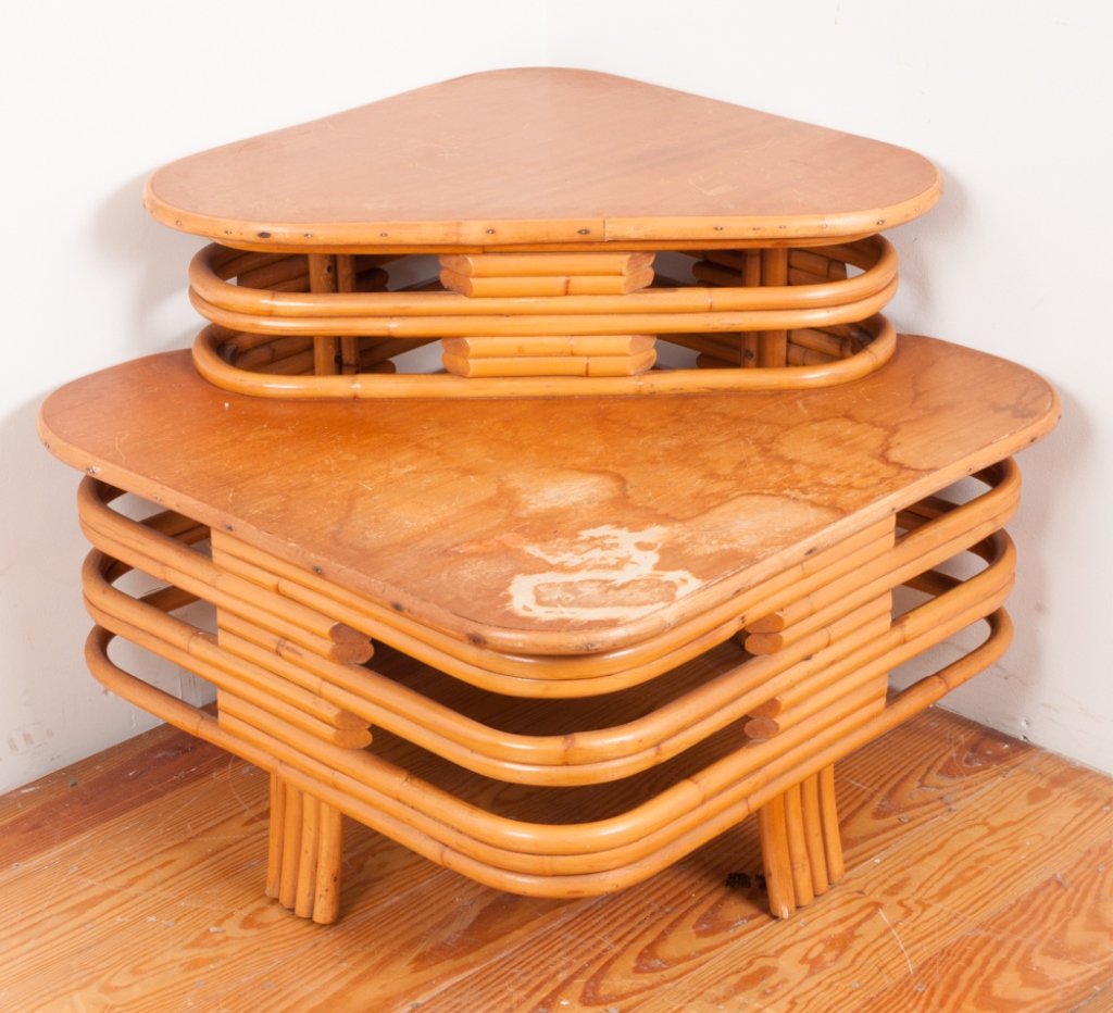 Tropical Sun Co. Paul Frankle Style Corner Table: Tropical Sun Company, Paul Frankl inspired banded bamboo-rattan two-tier corner coffee/ occasional table with stacked base and stylized cut-out sides; marked to inside with Tropical Sun Co. tag; measu