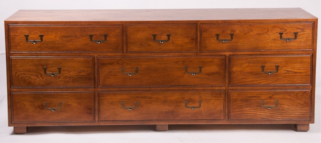 Henredon Artefacts Oak Nine Drawer Dresser: Henredon Artefacts oak dresser with nine drawers and brass handles; marked to top drawer; measures approximately 29-3/4" tall, 78" wide, and 19" deep; in Good condition, consistent with age and use.