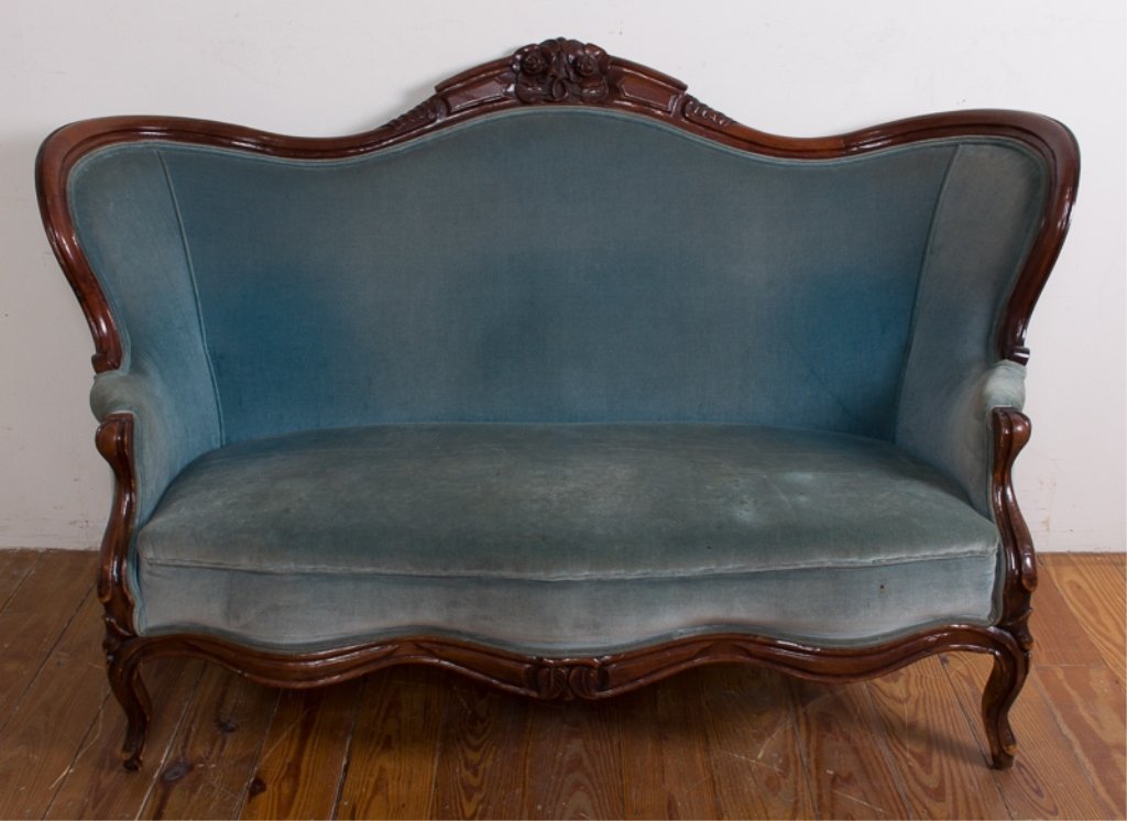 Victorian Parlor Triple Crest Settee: Victorian style, blue upholstered, high back parlor settee with carved floral and scroll wood frame; measures approximately 39-1/4" high, 64-1/8" wide, with a seat depth of 22-1/2" and seat height of 