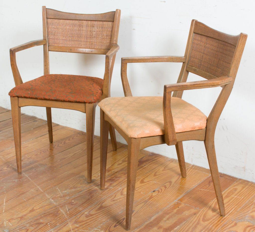 John Stuart Armchairs Pair: Two John Stuart mid-century armchairs with woven back rests and mixed upholstery to seats; placard to underside of front stretcher; each measures approximately 32-3/4" high, 21-1/8" wide with a seat d