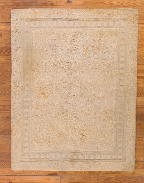 Edward Fields, 1965, "Georgica" 7' x 9'2" Rug: Plush beige hand-manufactured Edward Fields rug of 100% virgin wool face, marked to back edge in eight places "Edward Fields" as well as "100% Wool Face" and "1965"; measures approximately 7' x 9'2";