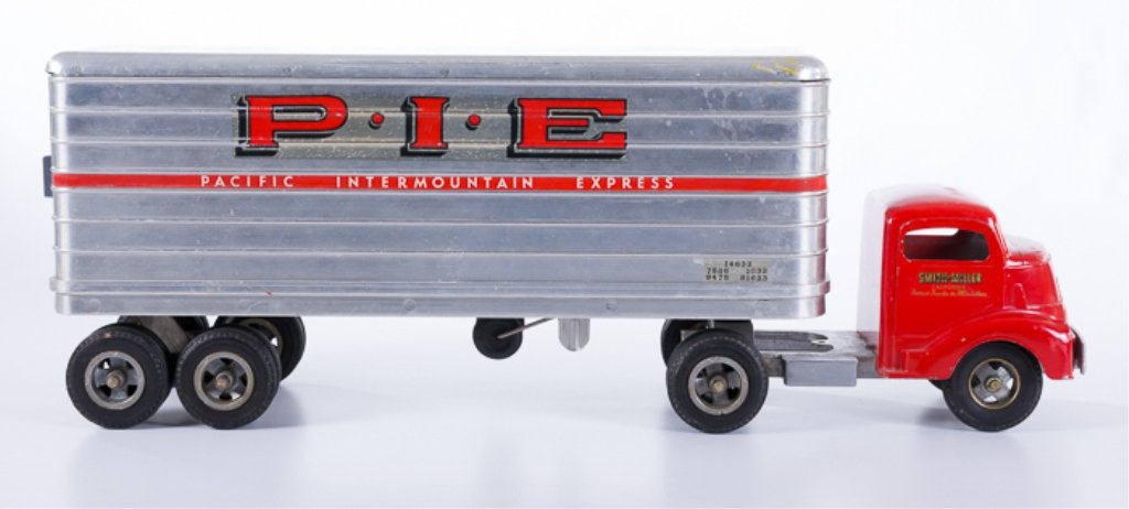 Smitty Toys Tractor Trailer: Vintage Smitty Toys Smith-Miller truck and P.I.E. (Pacific Intermountain Express) trailer. The cab has Smith-Miller Smitty Toys, California Famous Trucks in Miniature, on the side of each door. The Tr