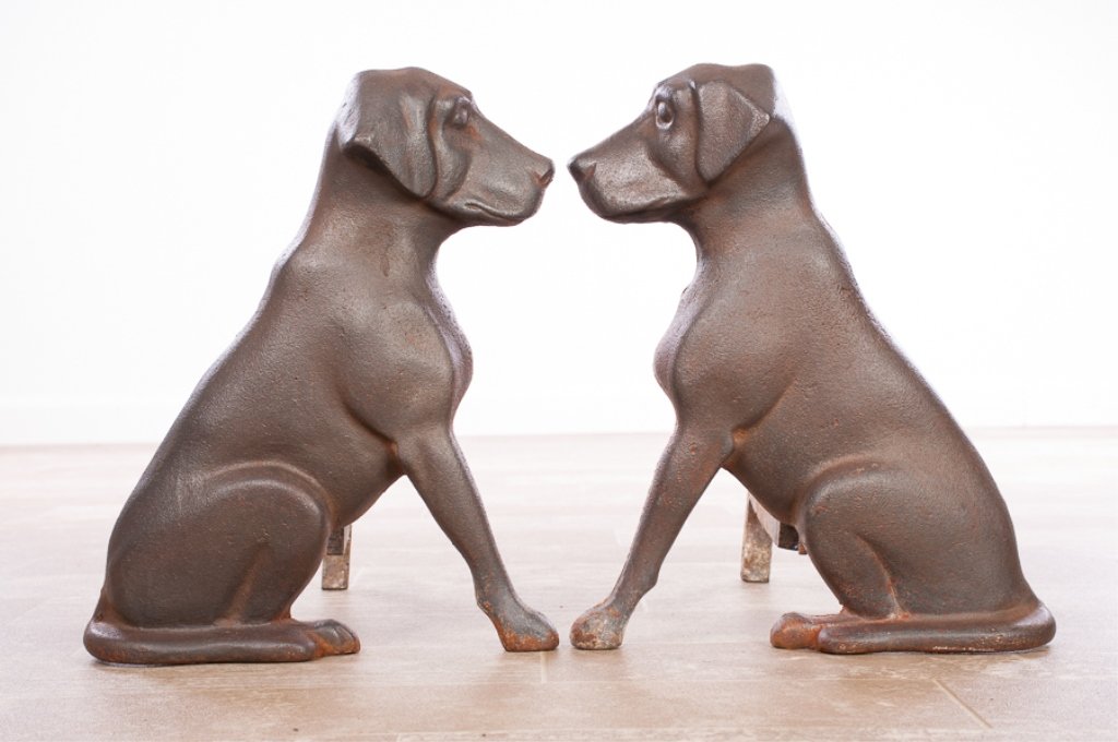 Liberty Foundry Labrador Andiron Set: Pair of Liberty Foundry cast iron andirons in the shape of seated Larador Retriever pups; measure approximately 14" high, 11-1/2" wide, 14-1/4" long/deep, each. Marked Liberty Fdy., St. Louis, Missour