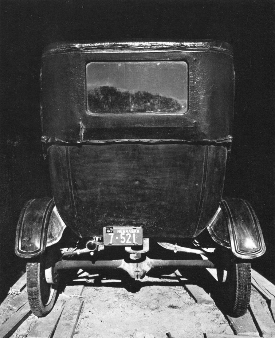 Wright Morris - Model T - Gravure: 1966 Photograure and Color Company, Moonachie, NJ (printer) Sheet-fed Gravure - 1947 Picture of a garaged momdel T in Nebraska - Image Size approx. 6.5"x 8"