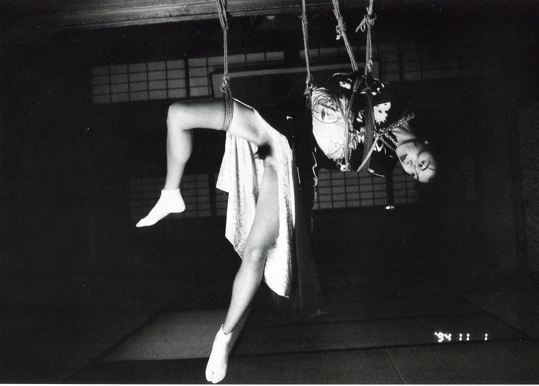 Nobuyoshi Araki - Suspended 1994 - Duotone: This is from a compilation of Mechanical Duotones beautifully printed in 1995 in France - Image size 11 x 7.5 . Photo Mounted with acid free tissue on conservation mat-board