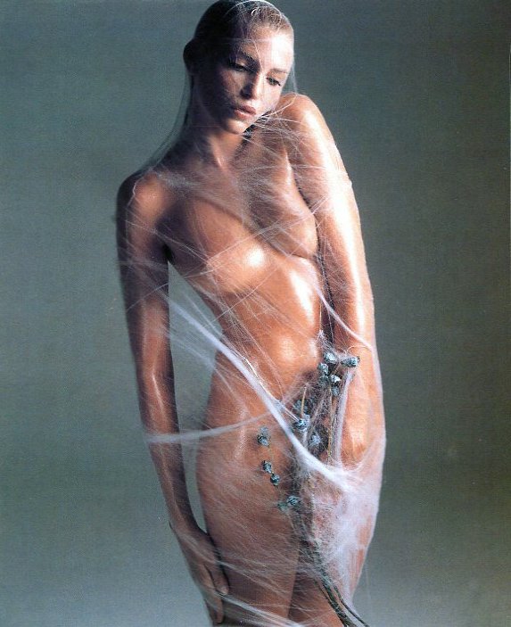 Richard Avedon, Nadja Auermann, NY 1995: This is from a series of images taken for the Pirelli calendar. These were published in 1997 in offset lithography and will be photo heat mounted on acid free matboard. The image size is approx 9 x 5