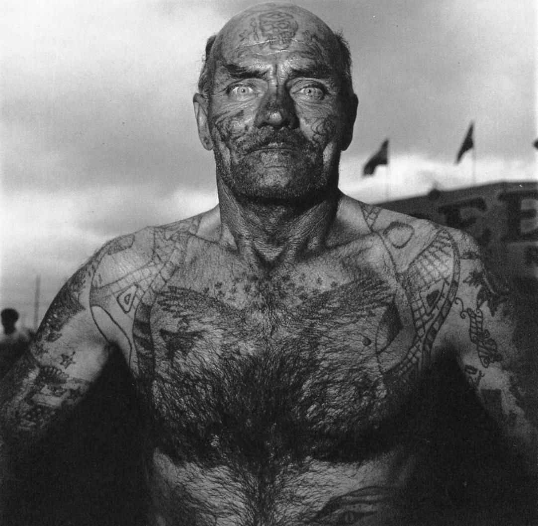 Diane Arbus - Tattoooed Man: 1972 Sheet-fed Gravure printed by C.J. Bucher (swiss printers) -. Image size approx. 7 x7