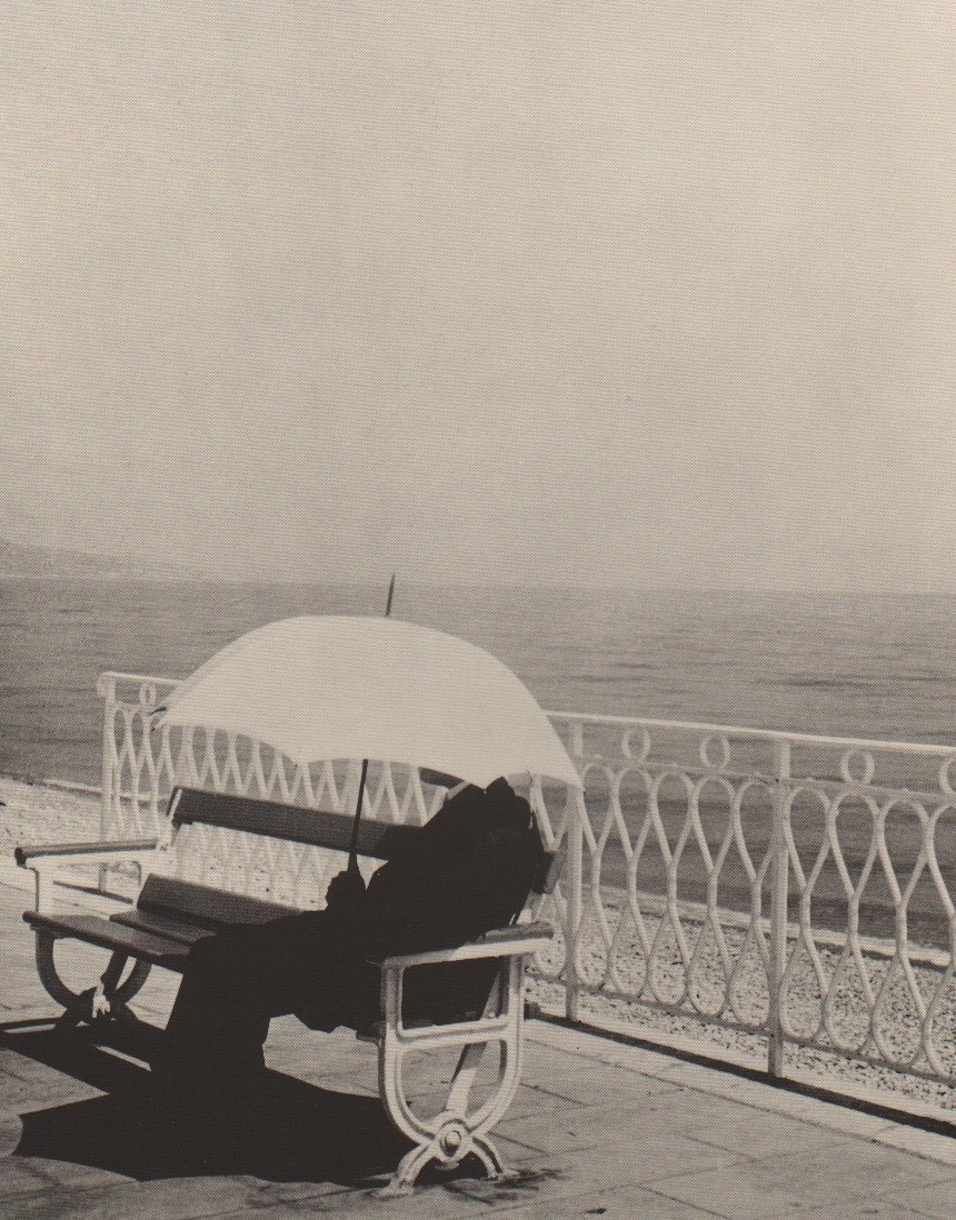 Brassai - Umbrella: Photo-Litho printed in 1993 in USA - Image Size 8.5" X 10.5" - Paper 11x14" (photographer name & year taken appears on left below photo)