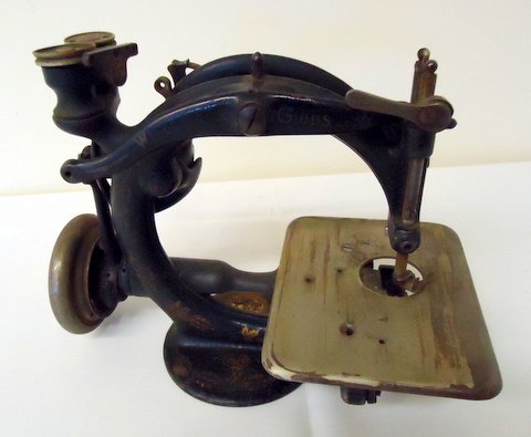 Willcox & Gibbs Sewing Machine: Willcox & Gibbs sewing machine patented August 28, 1894 Go to this link for more information and history about Willcox & Gibbs sewing machines: http://www.sewalot.com/willcox_gibbs.htm