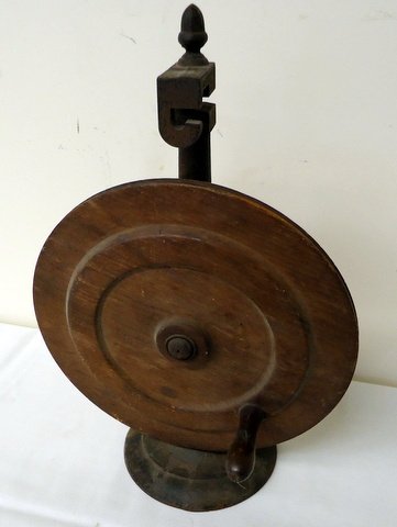 Early Science Tool: early wooden wheel on cast-iron upright - 15"x10"x7". This is an interesting, possibly very early device that may have been part of a static machine. Nicely made, attractive.